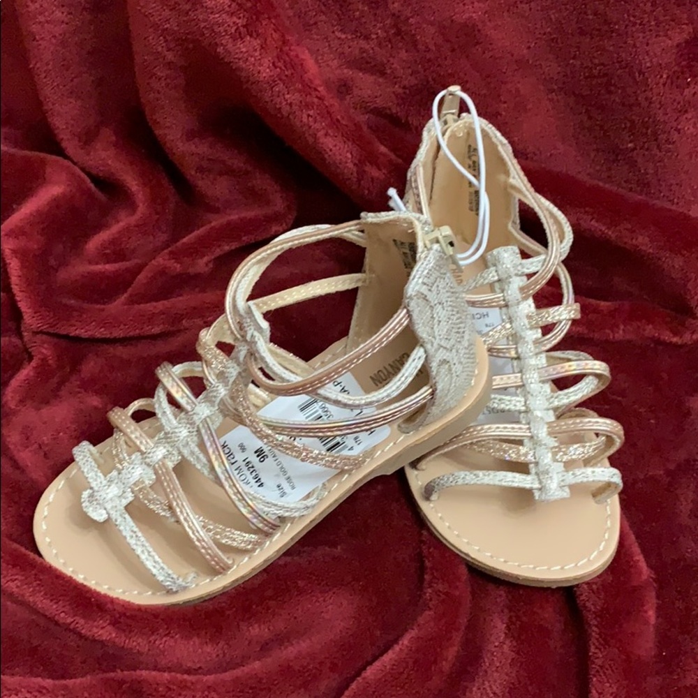 Little girls gladiator type sandals.